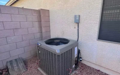 Residential outdoor AC condenser unit installation by Falcon Air Conditioning, providing air conditioning and heating services in Mesa, Arizona.