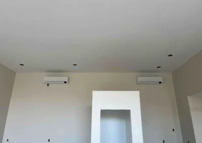 Two wall-mounted mini-split AC units installed in a Mesa, AZ home