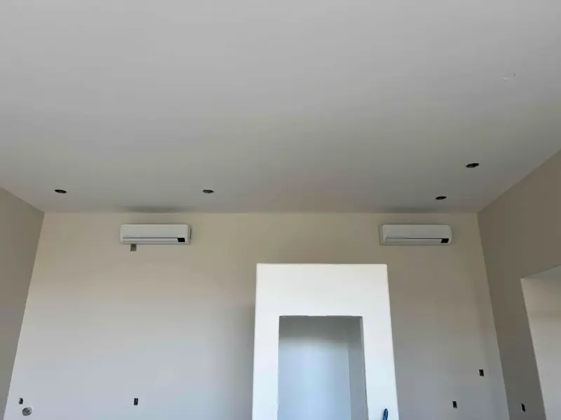 Two wall-mounted mini-split AC units installed in a Mesa, AZ home