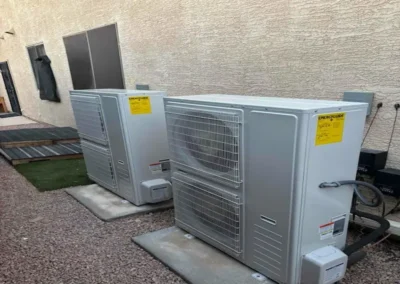 Two outdoor AC units installed at a Mesa, AZ home